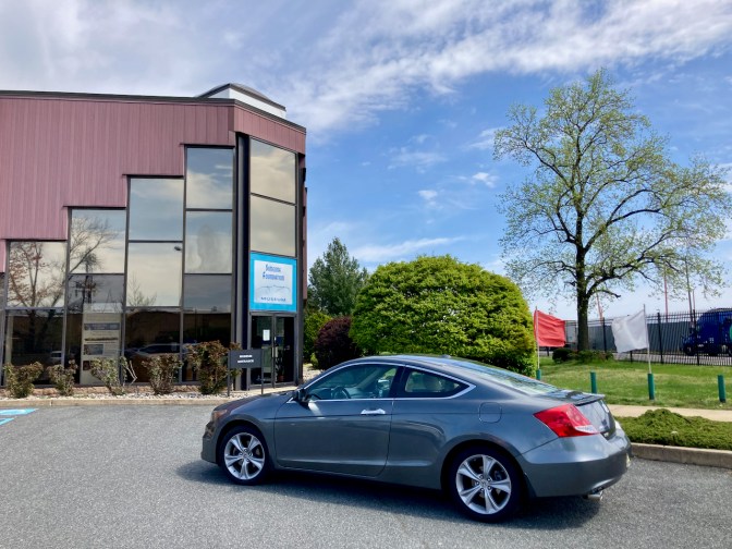 2012 Honda Accord parked in front of Simeone Foundation Automotive Museum.