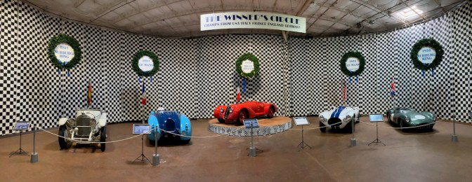 Panorama of five cars that have won races, each from USA, Italy, France, Germany, and England.