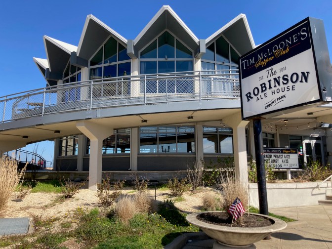 Exterior of restaurant, with sign that says THE ROBINSON ALE HOUSE ASBURY PARK.