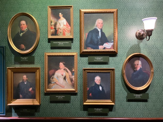 Paintings of Roosevelt family ancestors, hanging on wall.