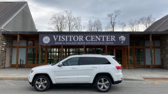 2014 Jeep Grand Cherokee parked in front of Visitor Center at Franklin D Roosevelt Presidential Library and Museum.