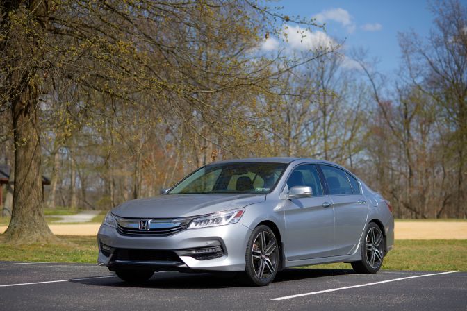 2017 Honda Accord V6 Touring parked in parking lot in front of municipal park.
