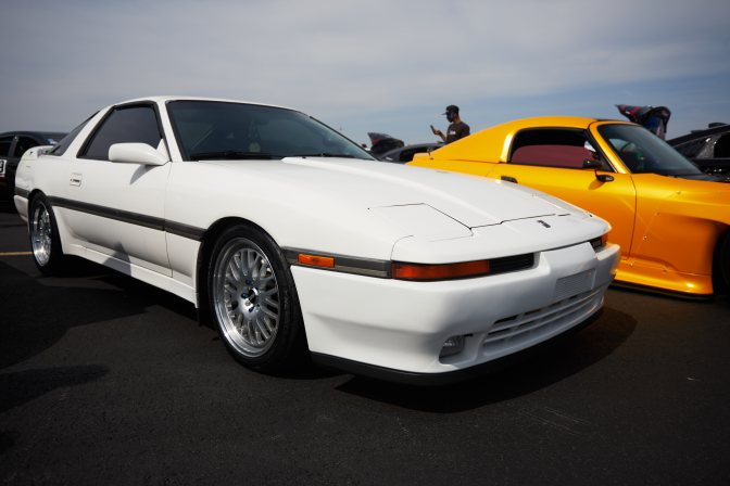 White third generation Toyota Supra.