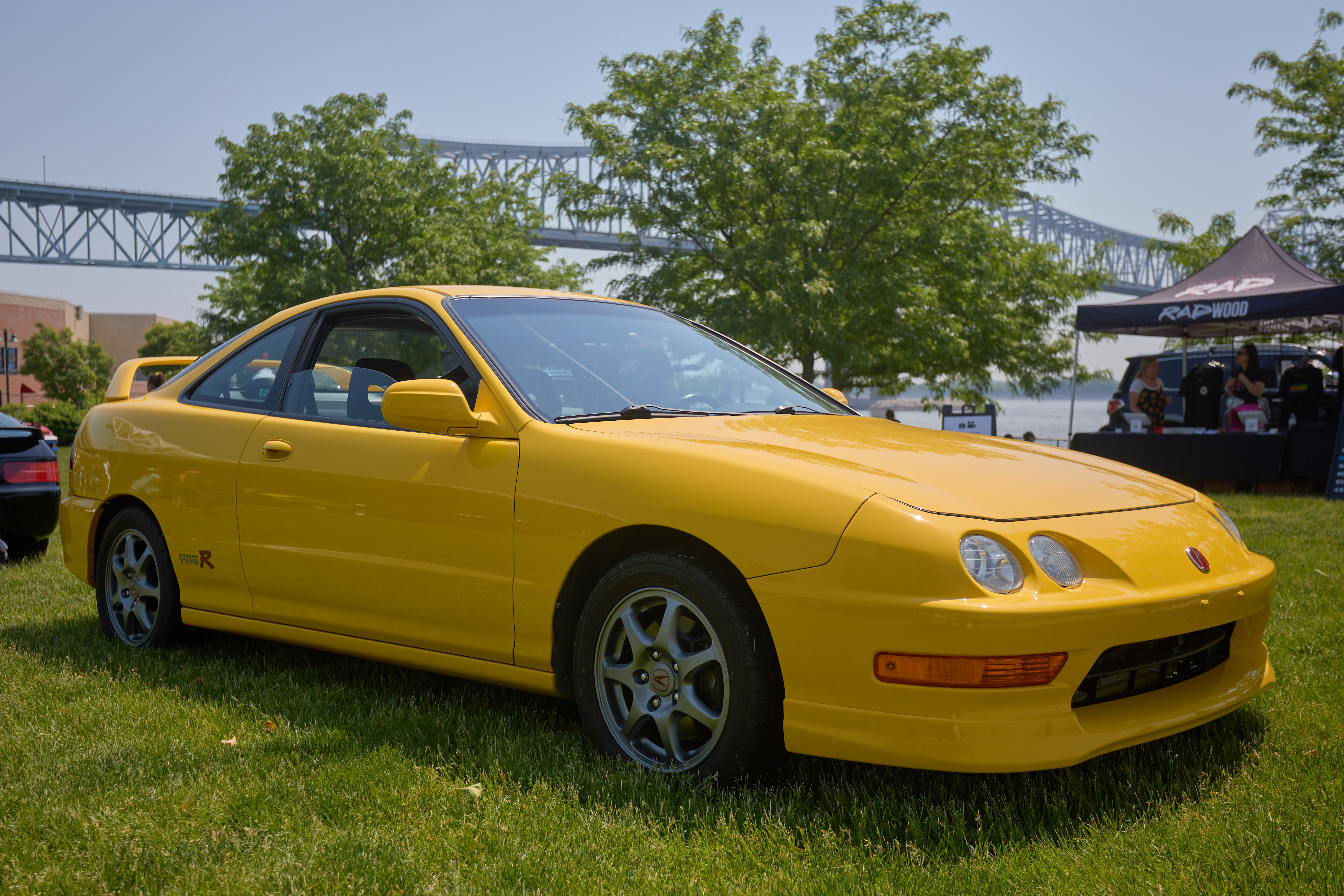 2001 Acura Integra Type R in Phoenix Yellow on grass.