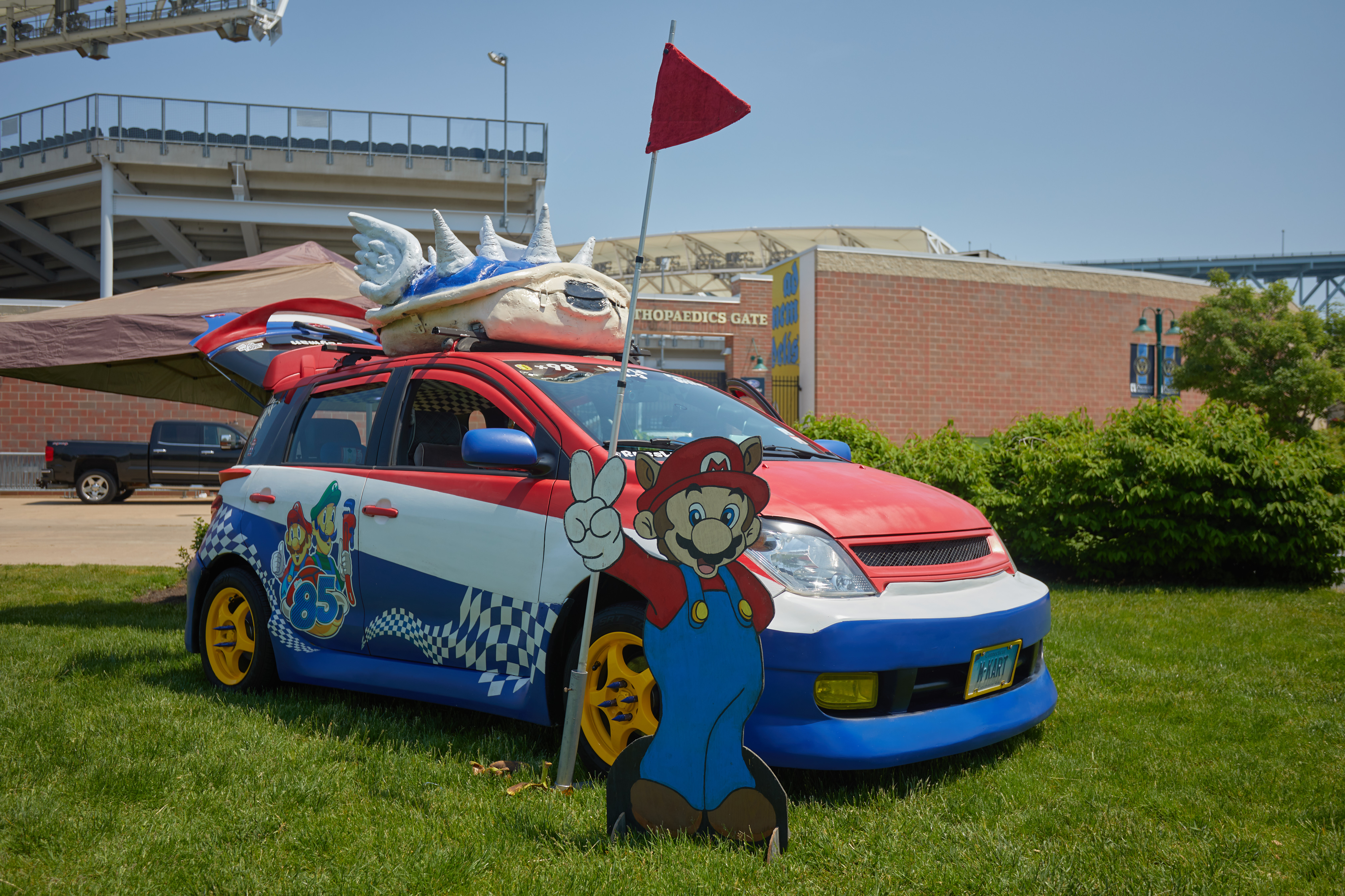 Scion Xa covered in Super Mario Bros themed-graphics.
