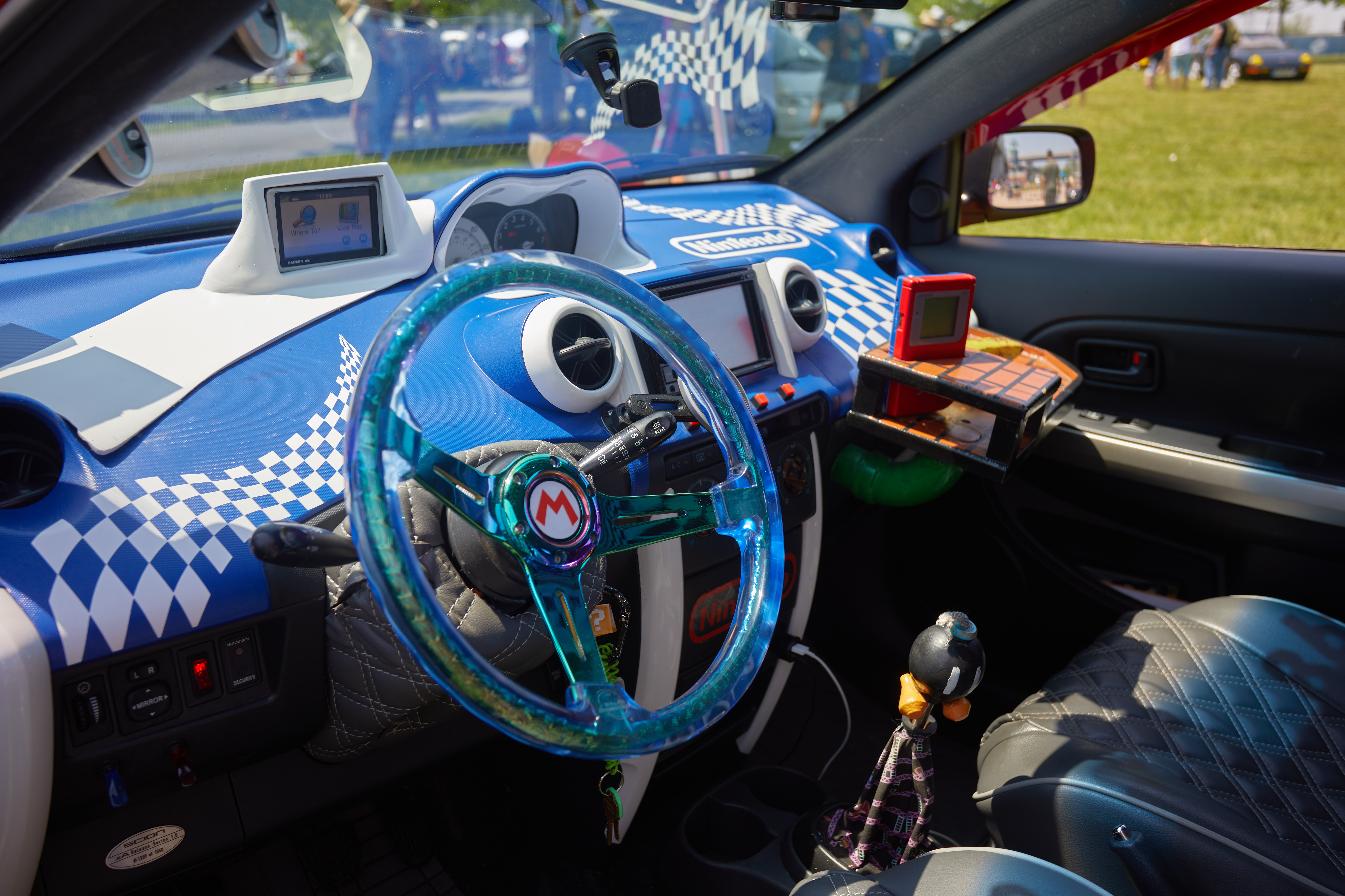 Interior of Scion xA, customized in Super Mario Bros themed artwork.