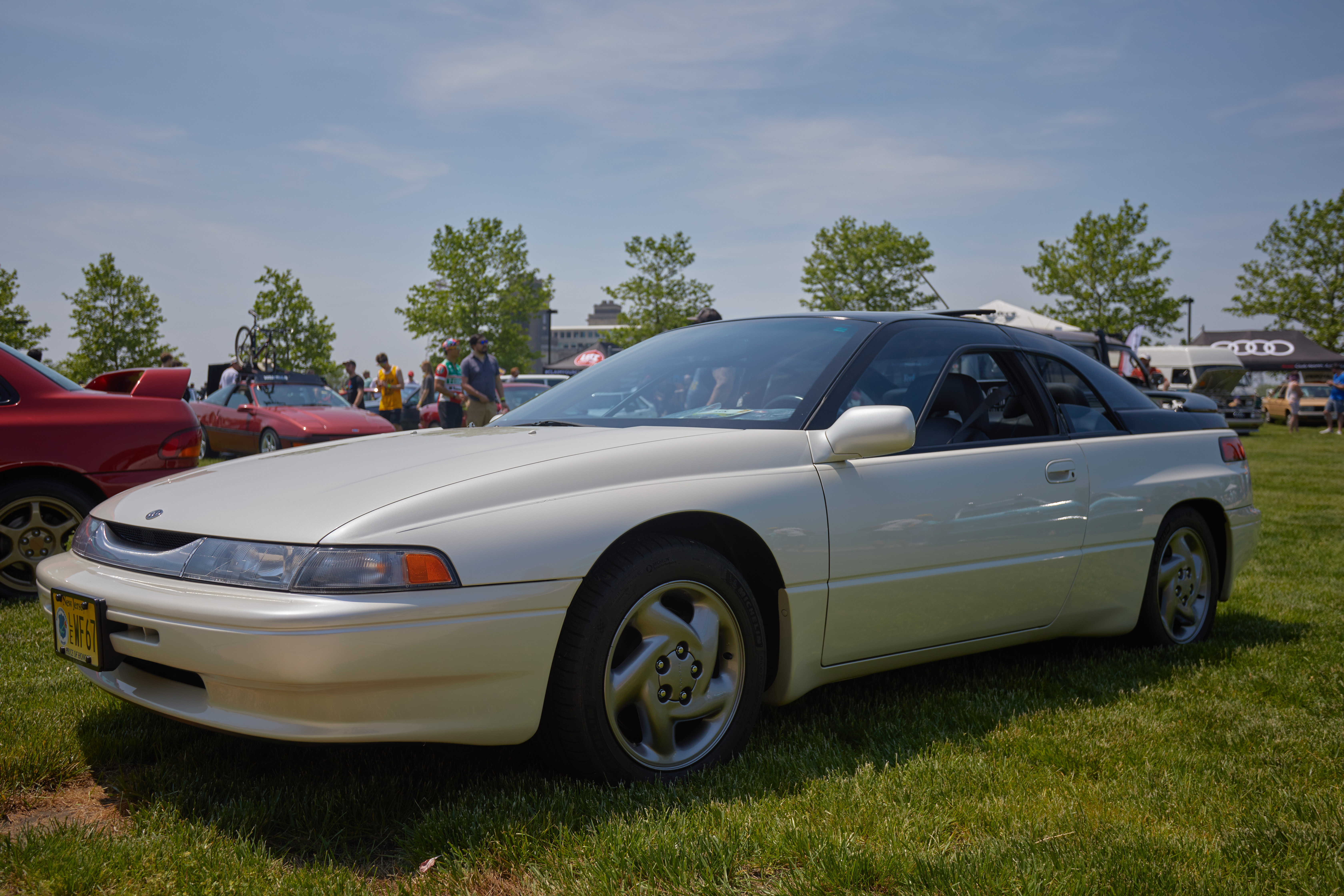 White Subaru SVX.
