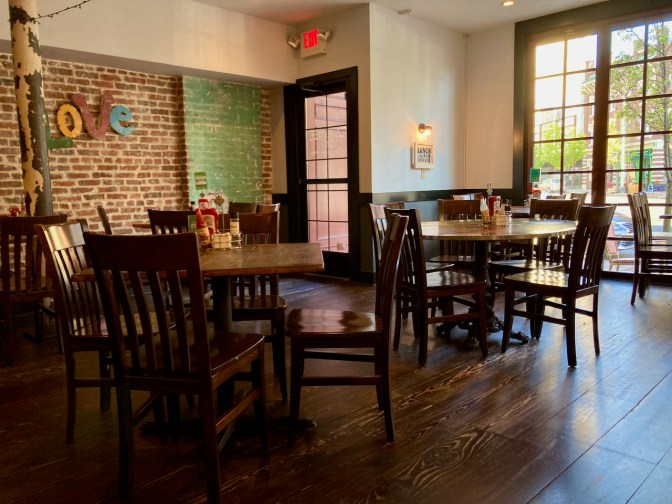 Interior of Toast City Diner in Asbury Park - all tables are empty.