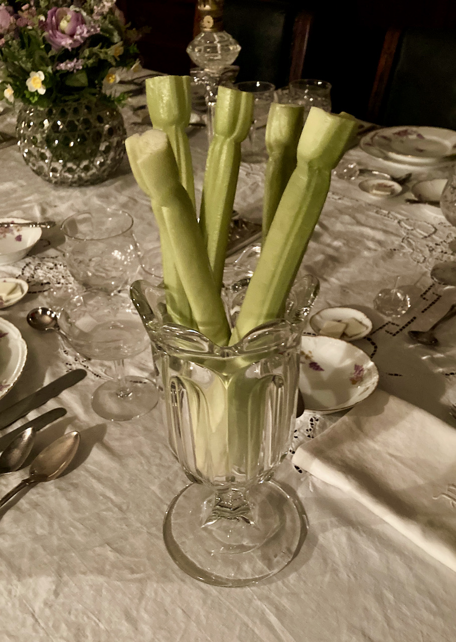 Celery vase on dining room table.