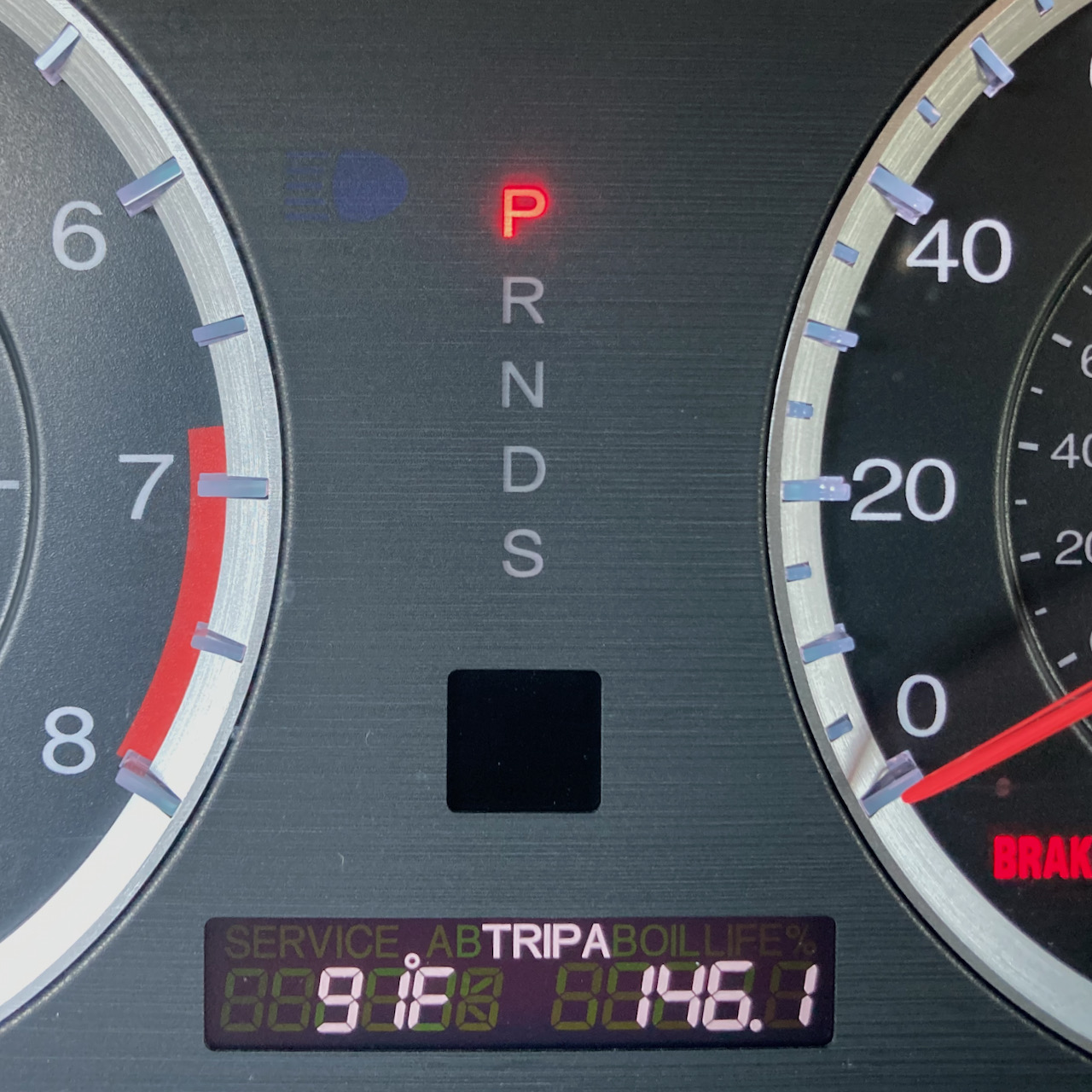 Temperature in car dashboard saying 91 degrees.