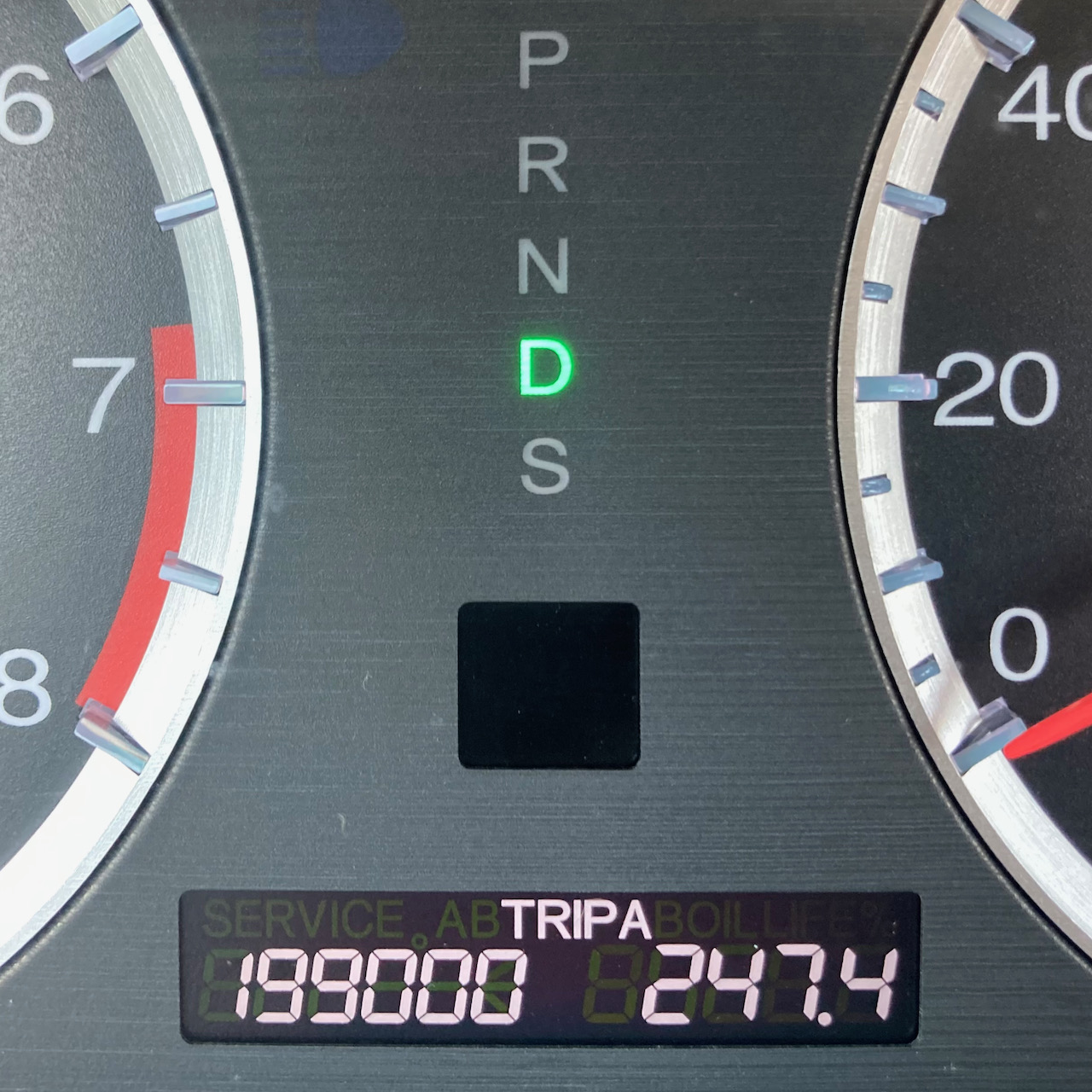 Car odometer reading 199000 TRIP A 247.4