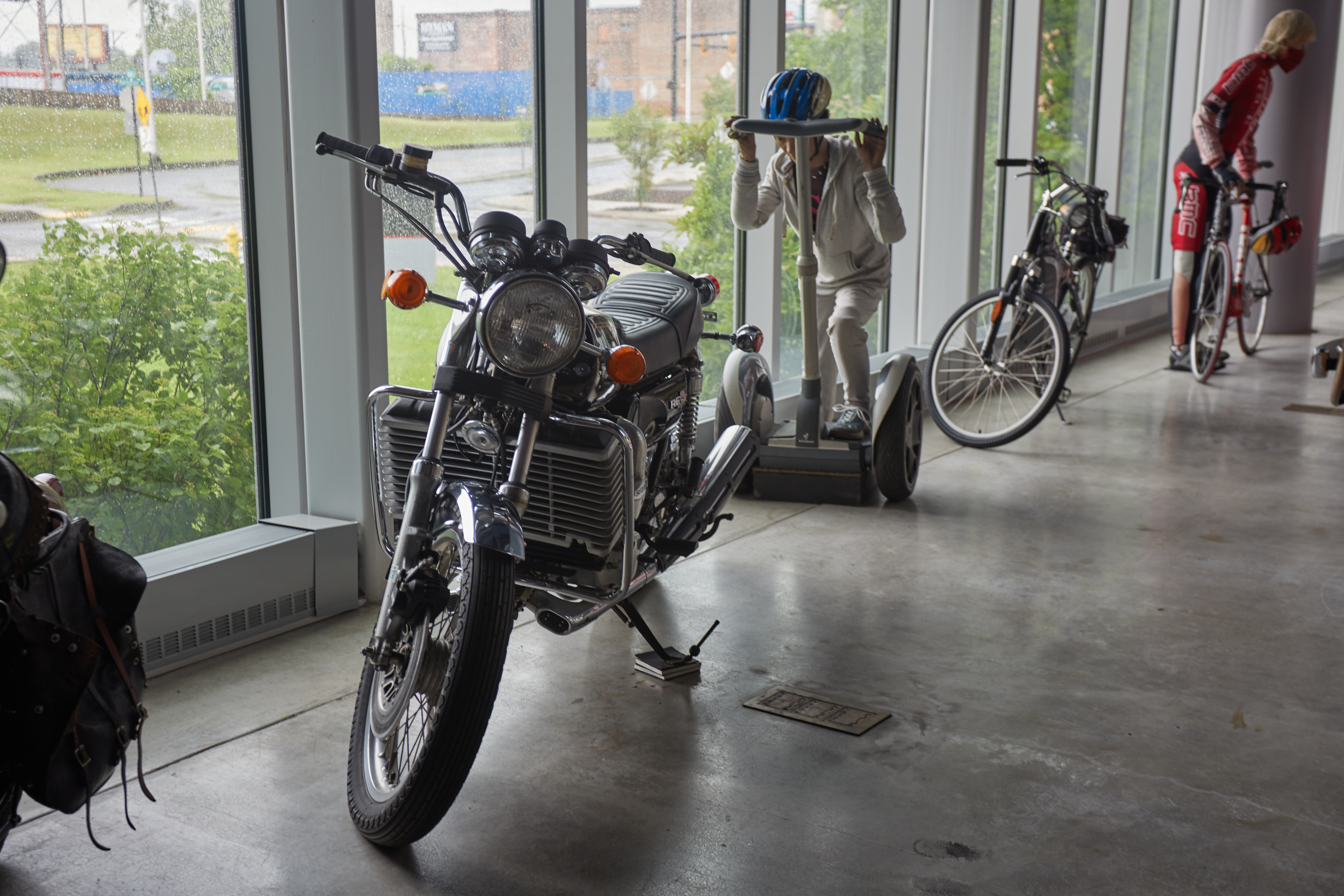 Suzuki RE5 Rotary motorcycle with Segway in background.