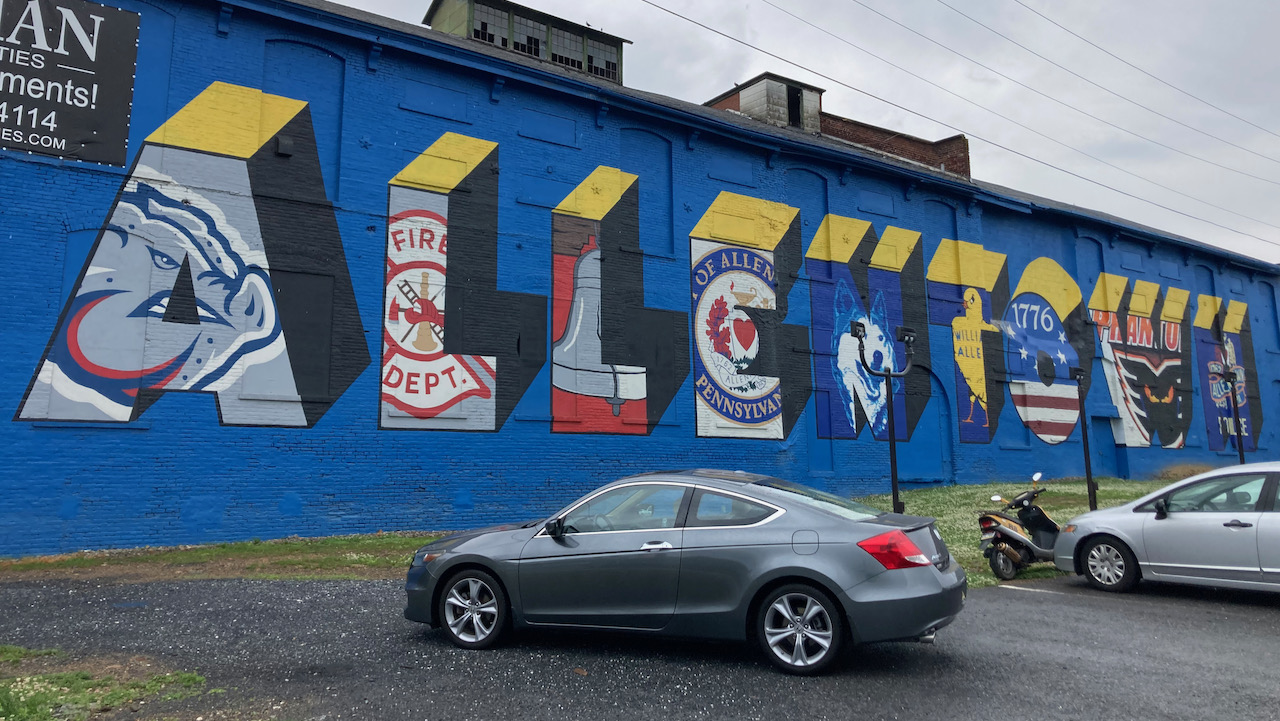 2012 Honda Accord coupe parked in front of building with mural of the word ALLENTOWN.