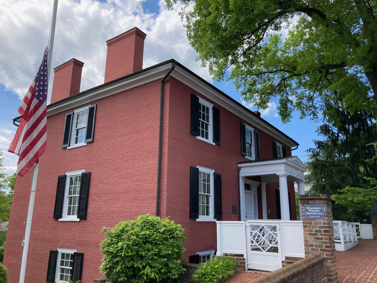 Two-story brick building in Federalist style.