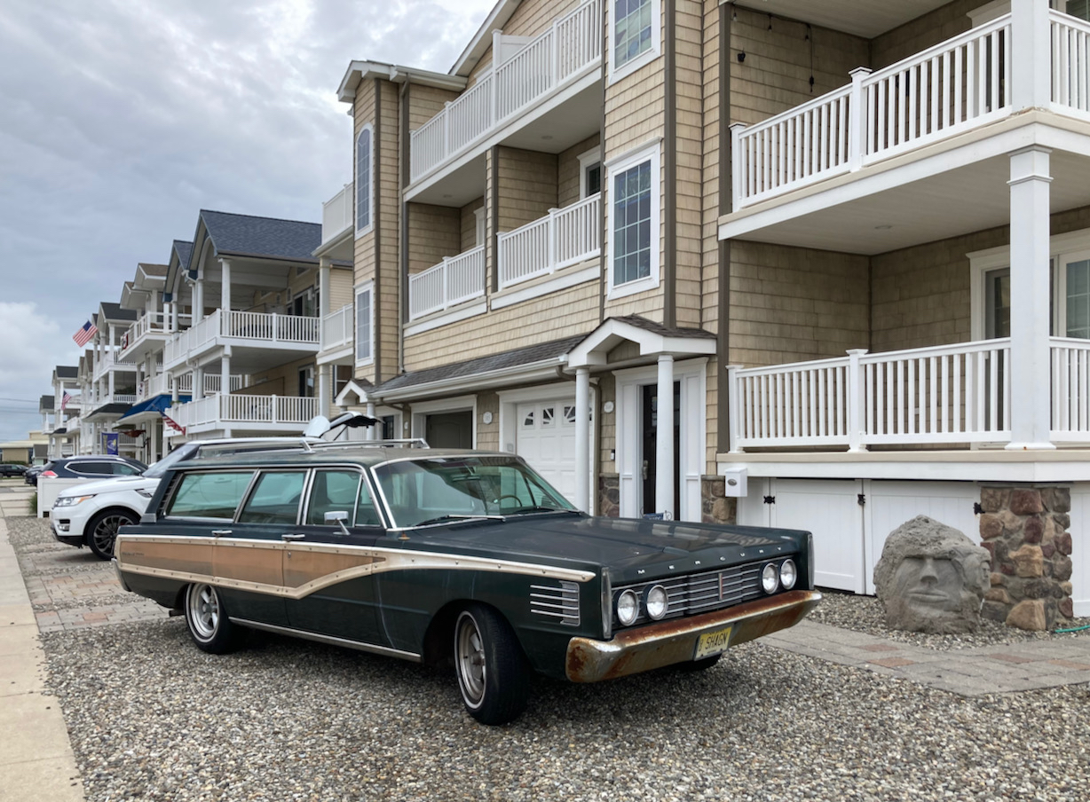 Mercury station wagon with wood paneling.
