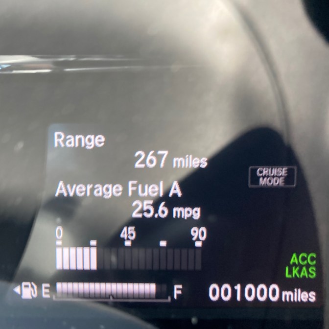 Car odometer reading 1000 miles.