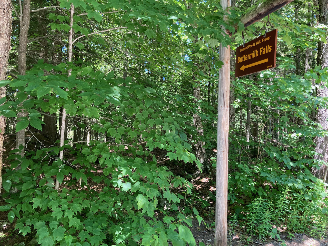 Entrance sign to Buttermilk Falls.