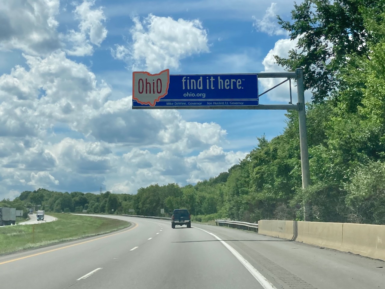 I-80 with sign over highway that says OHIO FIND IT HERE.