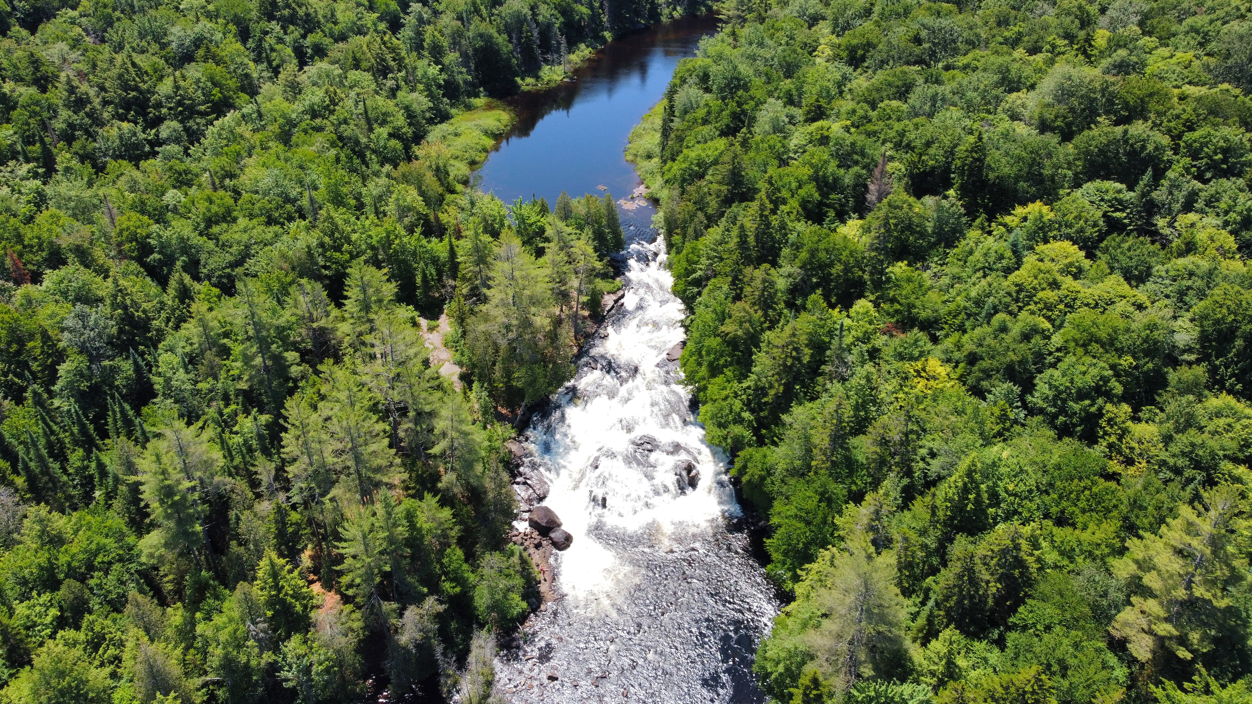 Aerial view of Buttermilk Falls and Long Lake.