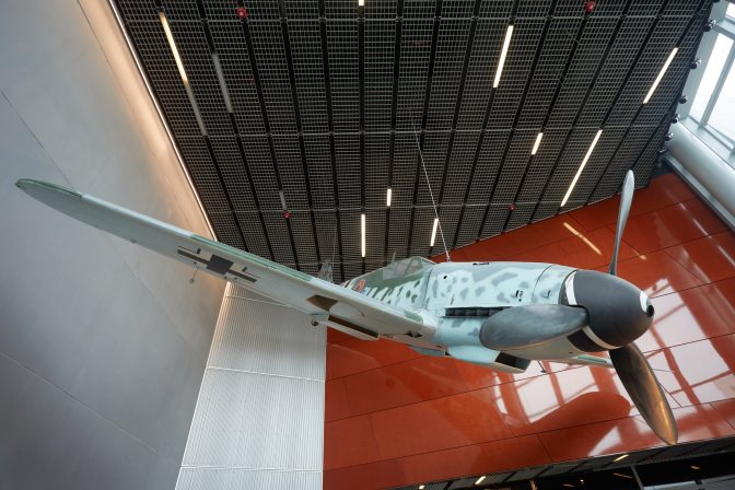 Me-109 fighter plane hanging from ceiling.