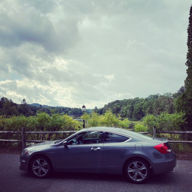 2012 Honda Accord parked in front of Moose River.