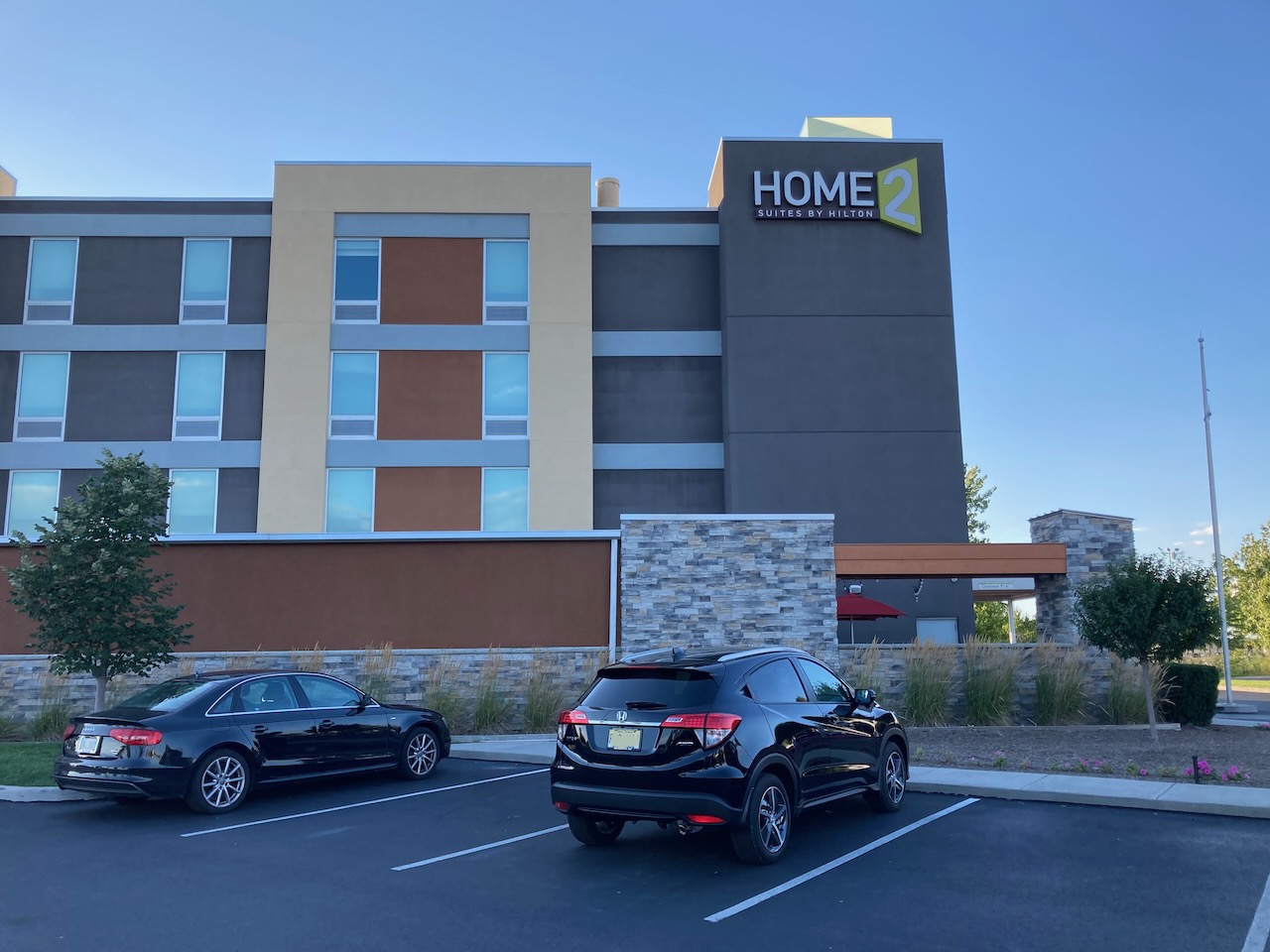 2021 Honda HR-V parked in front of Home2Suites Hotel.