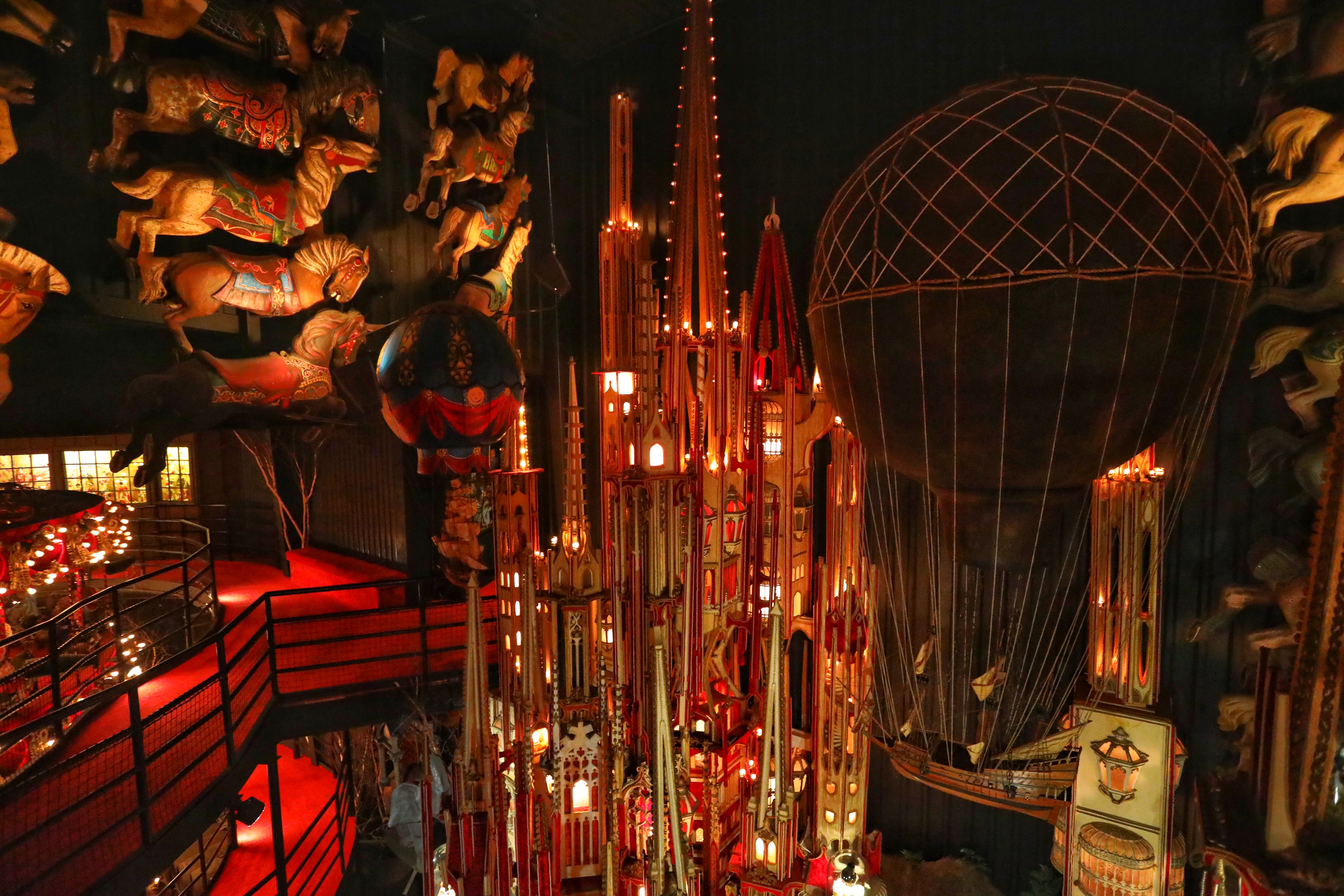 Skyscrapers and a boat floating in the air on a balloon.