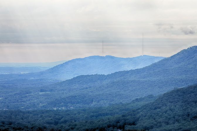 View of tree-covered hills.