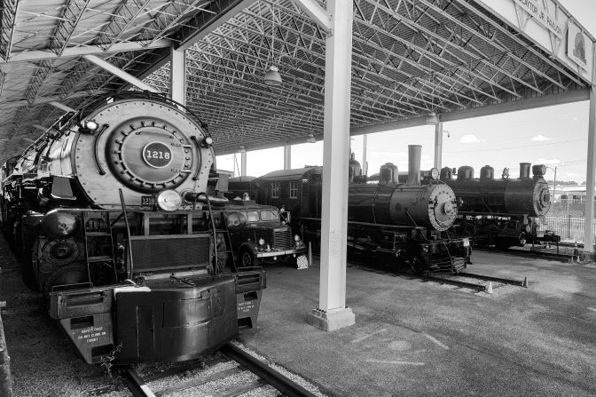 Steam engines in train yard.