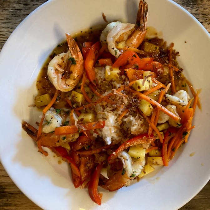 Polynesian shrimp in white platter.