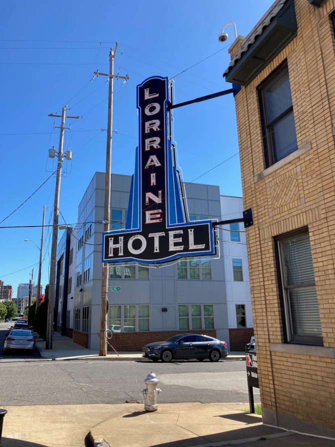 LORRAINE MOTEL sign on side of building.