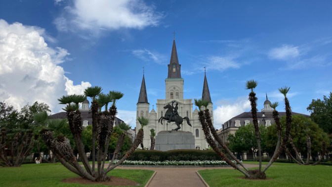 Jackson Square, with statute of Andrew Jackson in middle of park.