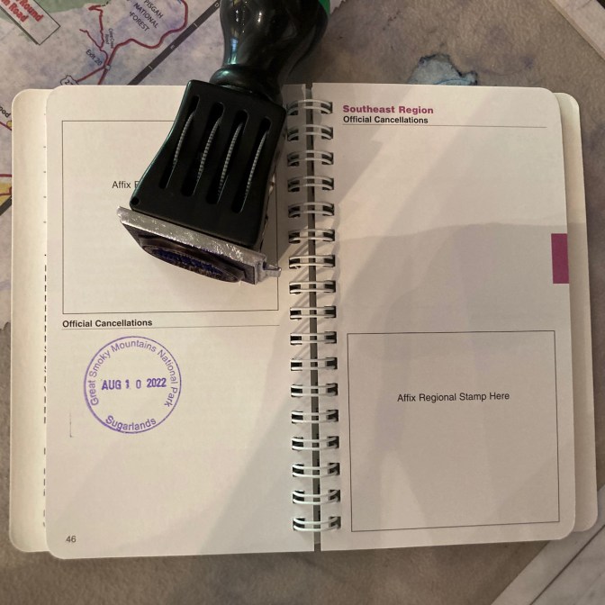 National Park passport with date stamp.
