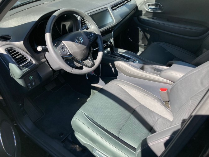 Front seats and dashboard of Honda HR-V.