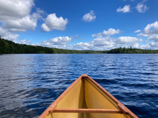 Canoe bow on lake.