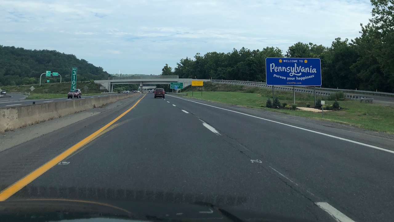 I-80, with sign on side of road saying WELCOME TO PENNSYLVANIA.
