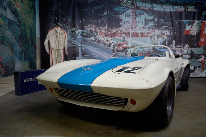 Chevrolet Corvette in front of Watkins Glen exhibit.