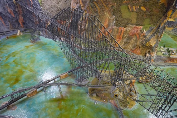 Railroad bridge over model diorama.