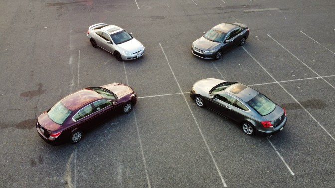 Aerial view of four Honda Accords.