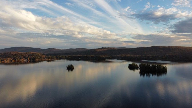 View of Fourth Lake and surrounding mountains.