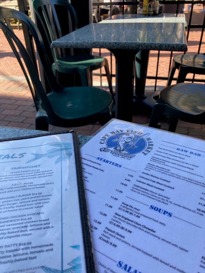 Menus for cape May Fish Market on table.