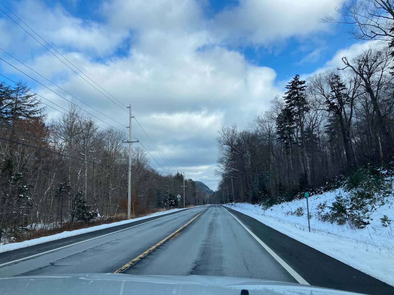 Snow-covered road in Adirondacks.