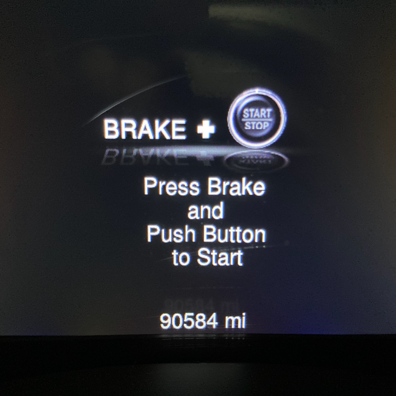 Car odometer reading 90,584 miles.