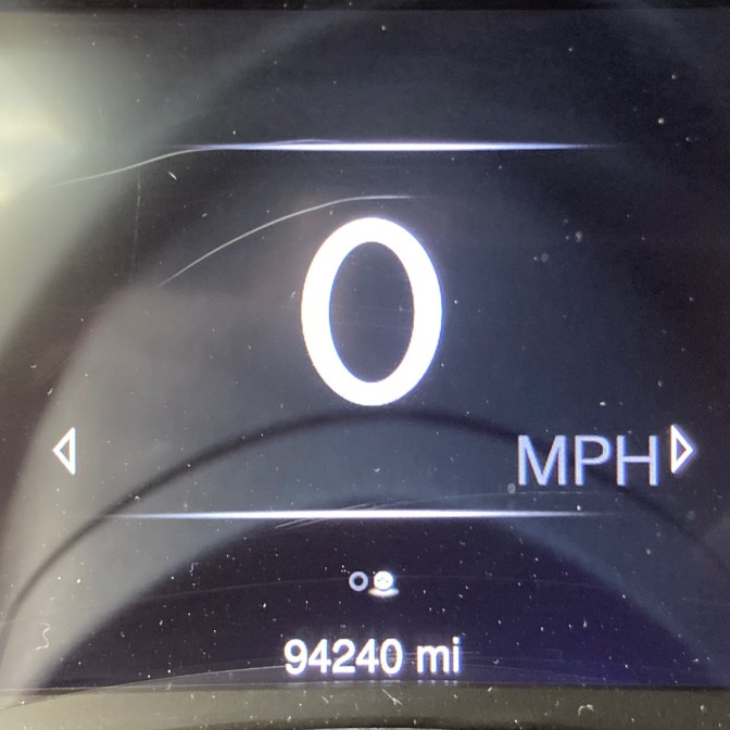 Car odometer reading 94240 miles