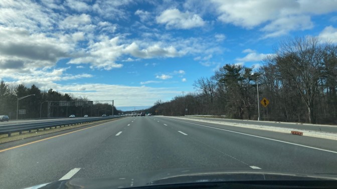 Sunny day with clouds above I-295.