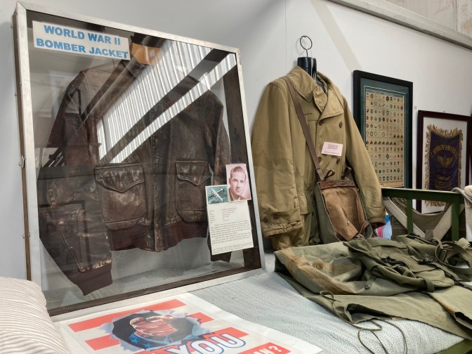 Display of flight jackets and other military aircraft apparel.