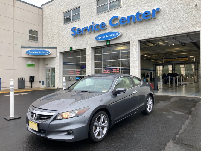 2012 Honda Accord parked in front of Burns Honda service center.
