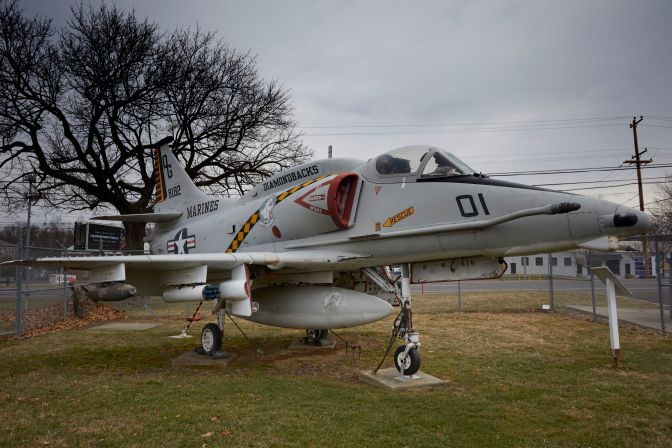 A-4 Skyhawk parked on grass.