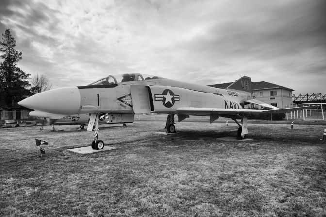 McDonnell-Douglas F-4 Phantom parked on grass.