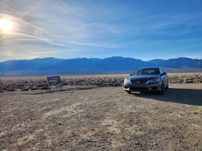 2014 Honda Accord parked beside Badwater Basin in Death Valley National Park.